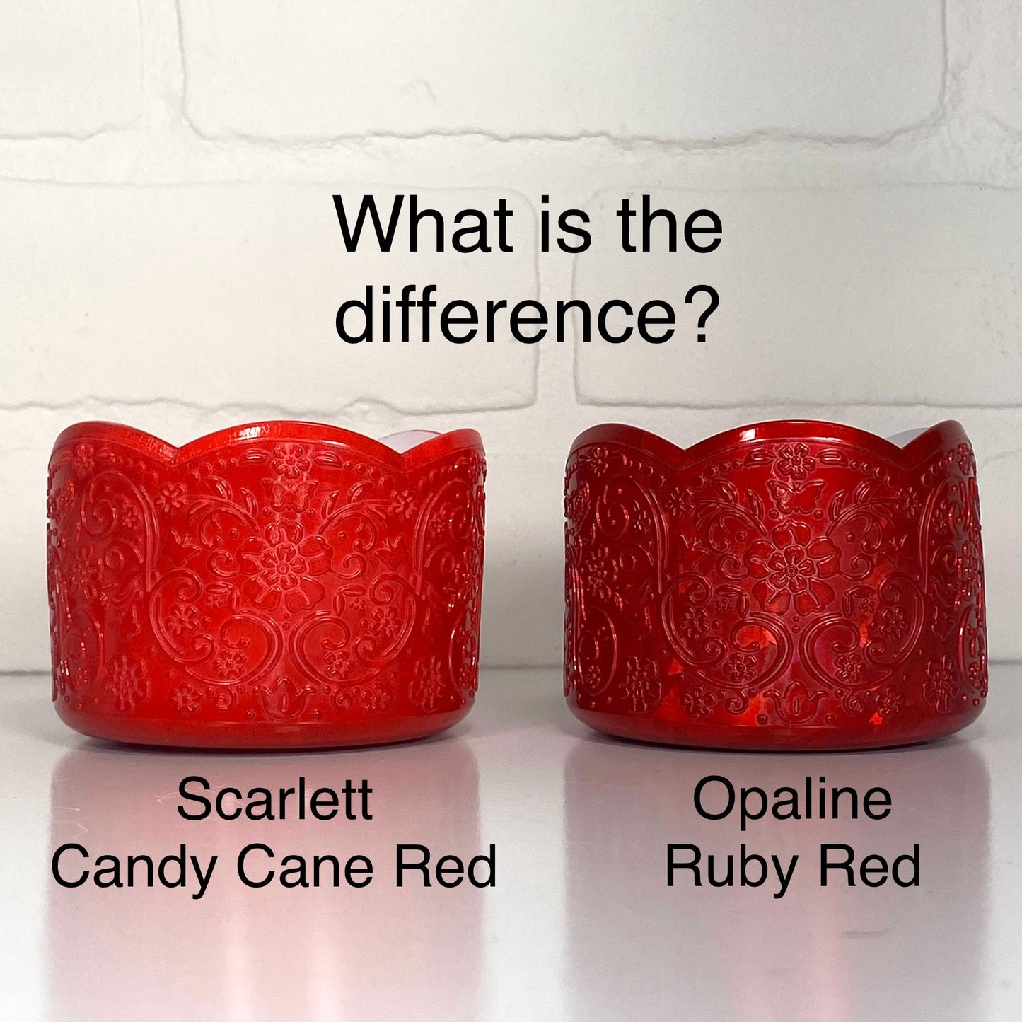 Two red LUXE tumbler boots labeled 'Scarlett Candy Cane Red' and 'Opaline Ruby Red' on a white background.